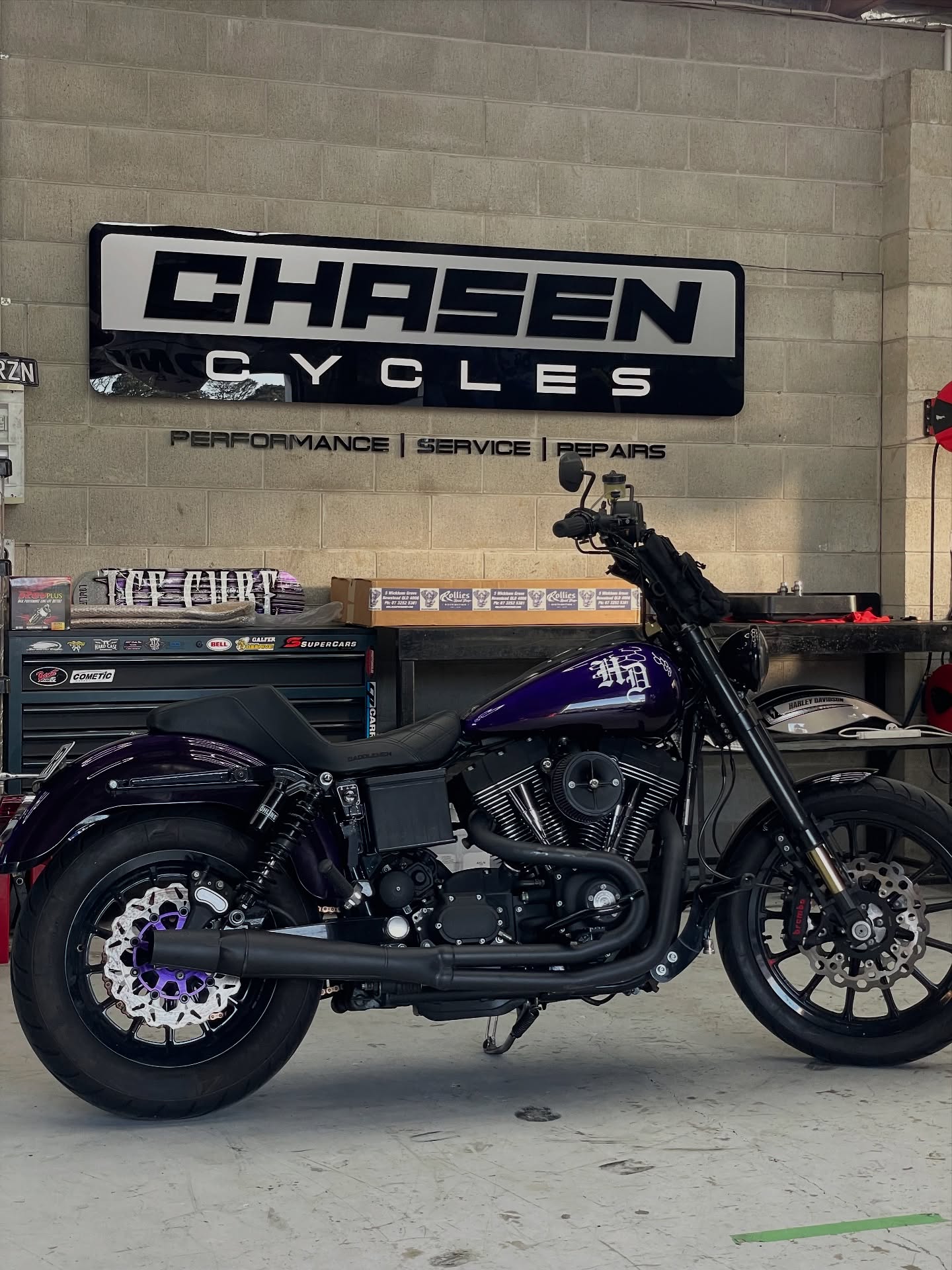 Purple Harley-Davidson Dyna Low Rider with Old English HD tank graphic